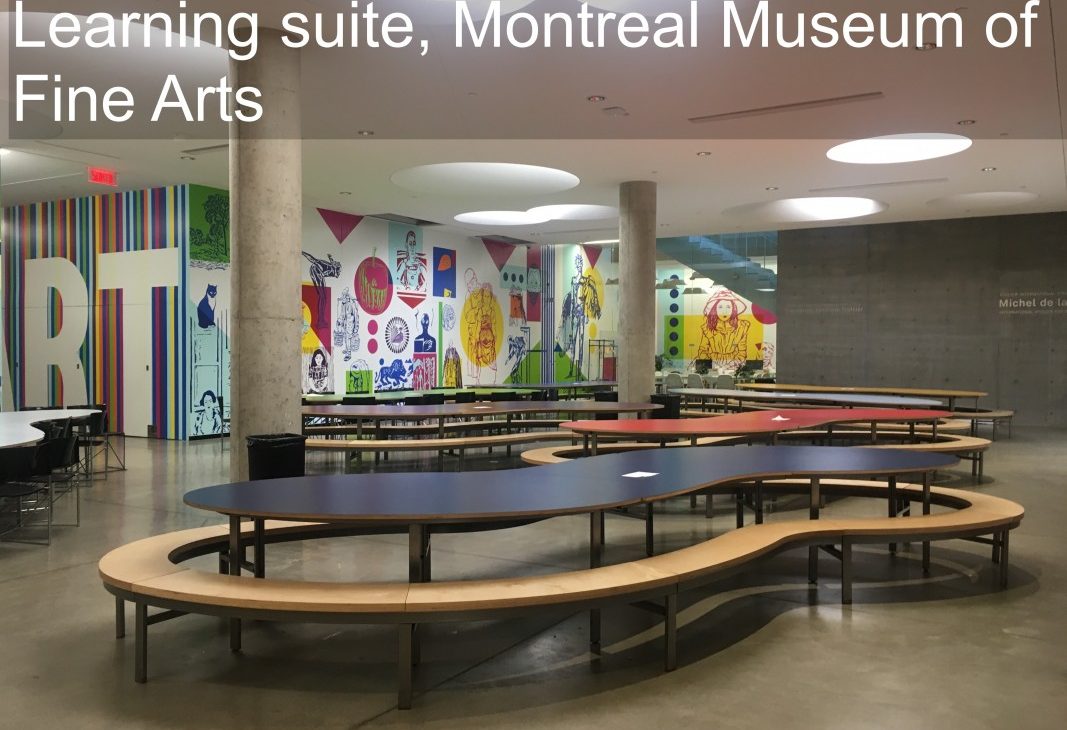 View into an open space with co-working irregular tables and benches set up; text reads: Learning suite, Montreal Museum of Fine Arts