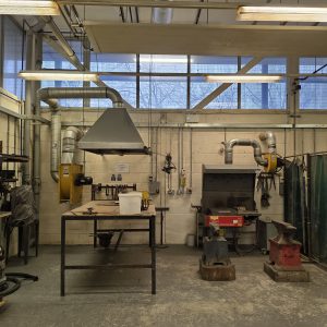 Metal workshop, pillar drill, work bench, anvil, chip forge