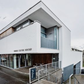 ESW's Bill Scott Sculpture Centre seen from the corner - a white building with steps down to the right.