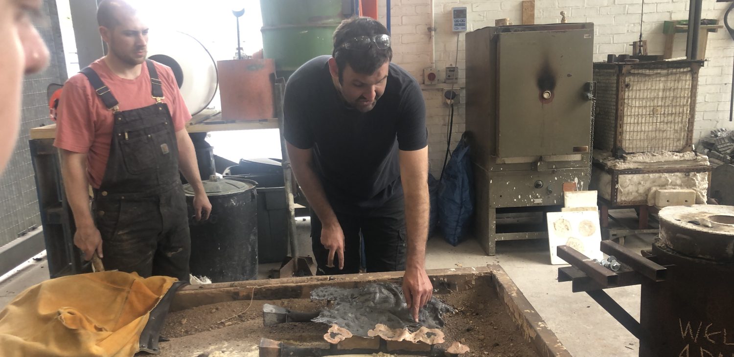De-moulding day, with collaborators explaining outcomes to audience, Alternative Foundry Practices.